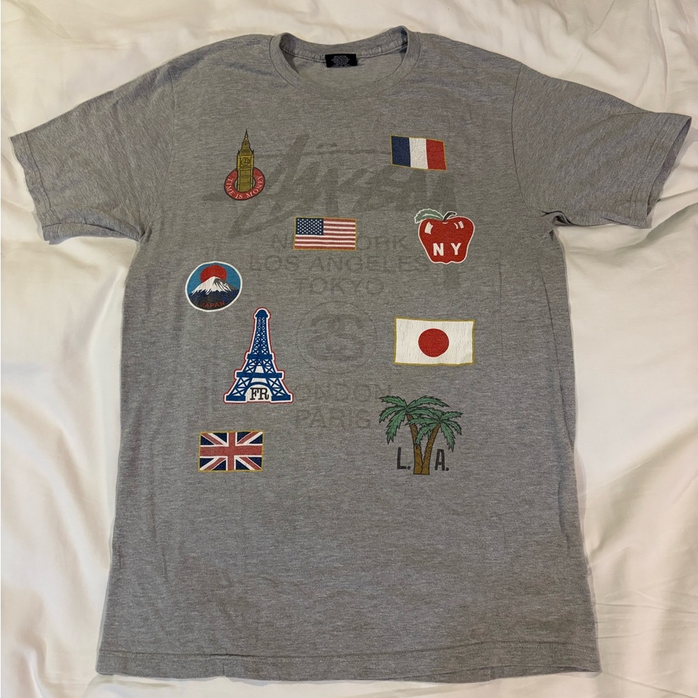 Stussy Gray Graphic Tee with Iconic locations